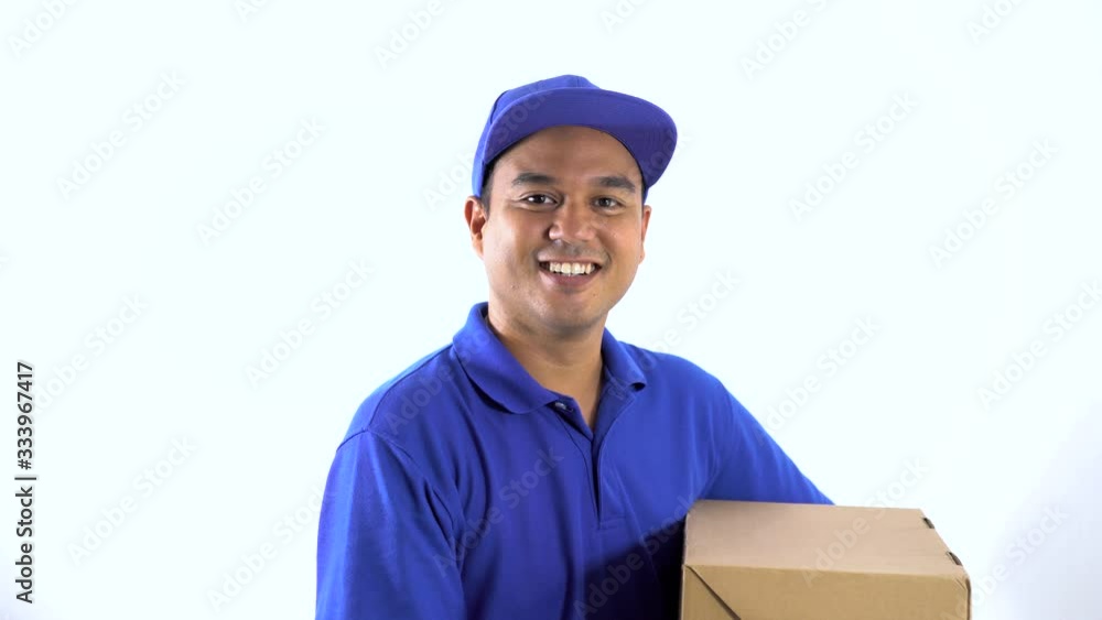 Blue Delivery handsome asian man holding parcel cardboard box on isolated white background. Blue Delivery handsome asian man holding parcel cardboard box on isolated white background.
