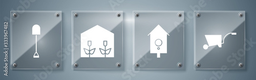 Set Wheelbarrow, Retro wall watch, Home greenhouse and plants and Shovel. Square glass panels. Vector