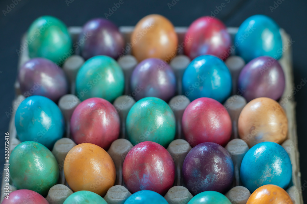 Easter background with hand painted purple, blue, green, orange Easter background with hand painted purple, blue, green, orange