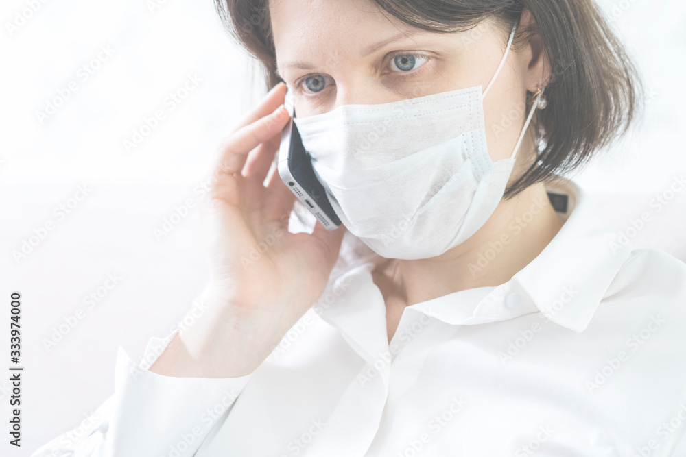 the girl working remotely during an outbreak of the coronavirus, selective focus, toned image.