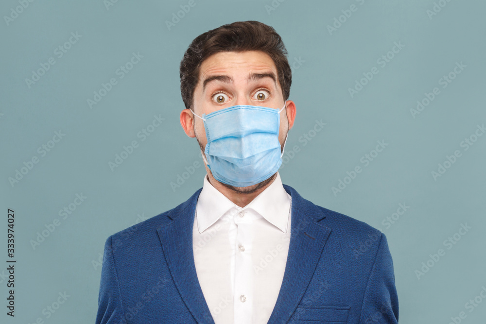 Closeup portrait of amazement manager open mouth and big eyes. Business people concept, richly and success. Indoor, studio shot on light blue background Closeup portrait of amazement manager open mouth and big eyes. Business people concept, richly and success. Indoor, studio shot on light blue background