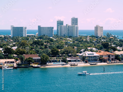 Miami, USA - March 29,2020: casual view on the buildings and streets near port Everglades at sunny weather