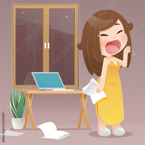 Woman yawning because they work at night at home