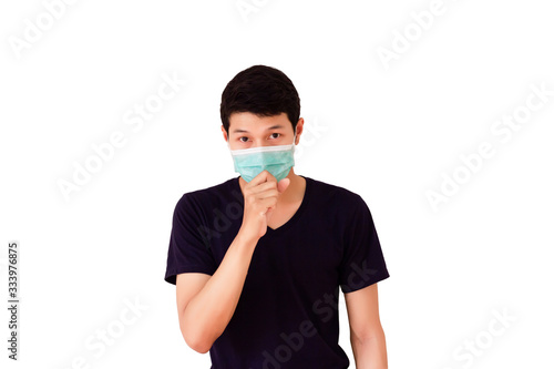 An Asian man is sick wearing a mask and is doing coughing
