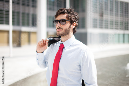 Successful businessman walking outdoor photo