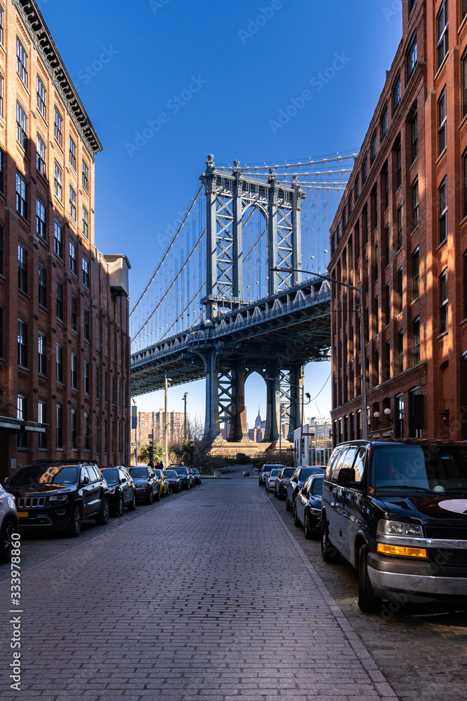 Down Under the Manhattan Bridge Overpass - DUMBO Point from brooklyn New york city NY USA. This is the neighborhood landmark located between manhattan and brookltn bridge in New York City USA.