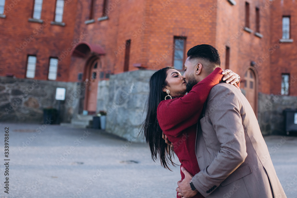 Loving happy couple hugging outdoors together. Dating and romance time for loving people Loving happy couple hugging outdoors together. Dating and romance time for loving people