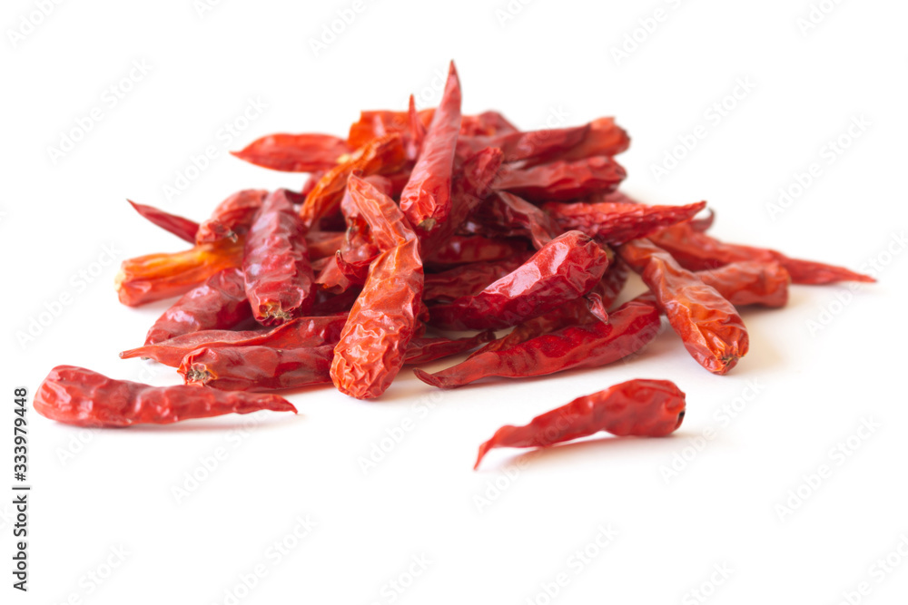 Dried pepper chillies on white background Dried pepper chillies on white background