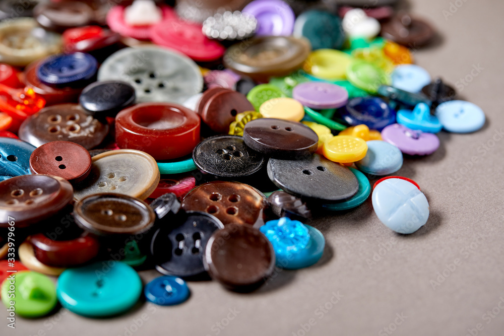 Background and texture of multicolored antique buttons