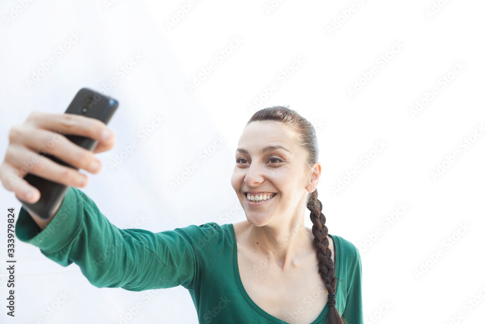 young girl with braid taking a selfie young girl with braid taking a selfie