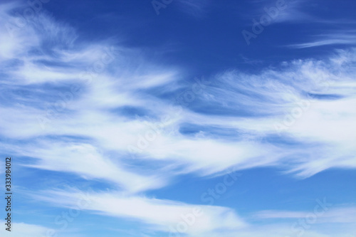 Fototapeta Naklejka Na Ścianę i Meble -  Beautiful blue sky and white cirrus clouds. Horizontal view. Background. Landscape.