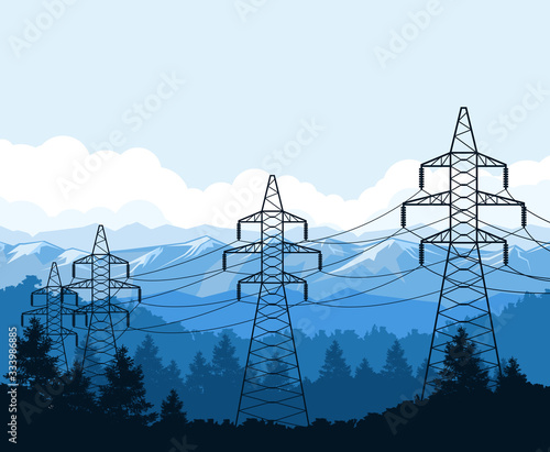 Tangent towers in mountains, high voltage power line pylons, power supply