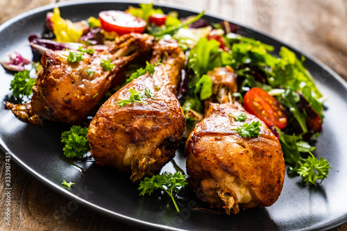 Barbecue chicken drumsticks with roast vegetables