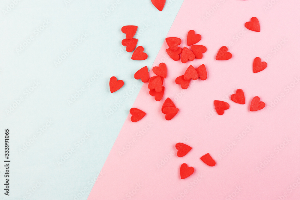 lots of little red hearts on a blue and pink background lots of little red hearts on a blue and pink background
