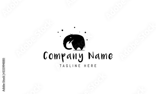 Vector logo on which an abstract image of a happy elephant.
