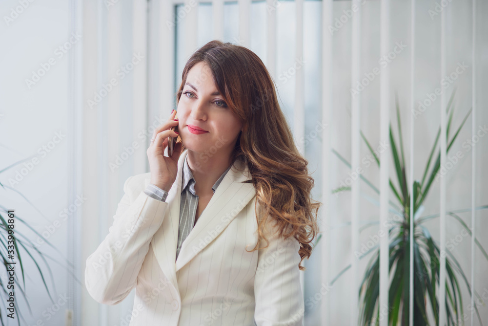 Young woman working in office on her working place Young woman working in office on her working place