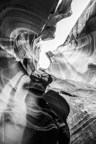 Beautiful view of amazing sandstone formations in famous Antelope Canyon on a sunny day near town Page. Arizona, USA (Black and white photo)