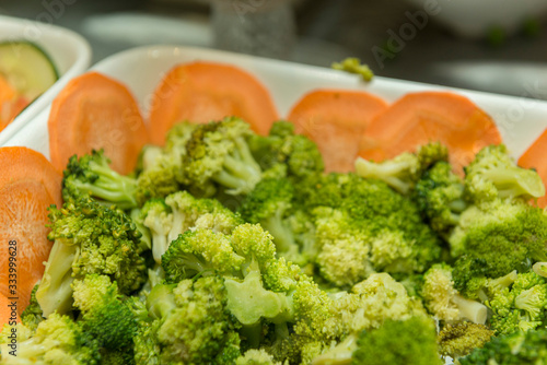 isolated dish of green salad, broccoli. Organic food for a healthy lifestyle.