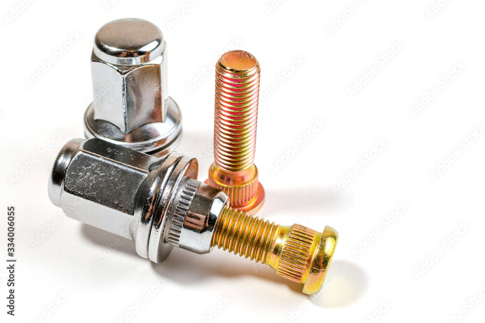 nuts and studs for a car on a table nuts and studs for a car on a table