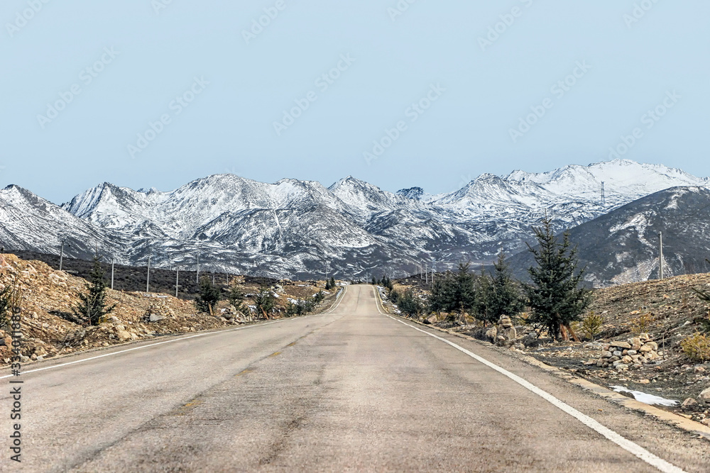 landscape of empty highway with snow mountain landscape of empty highway with snow mountain