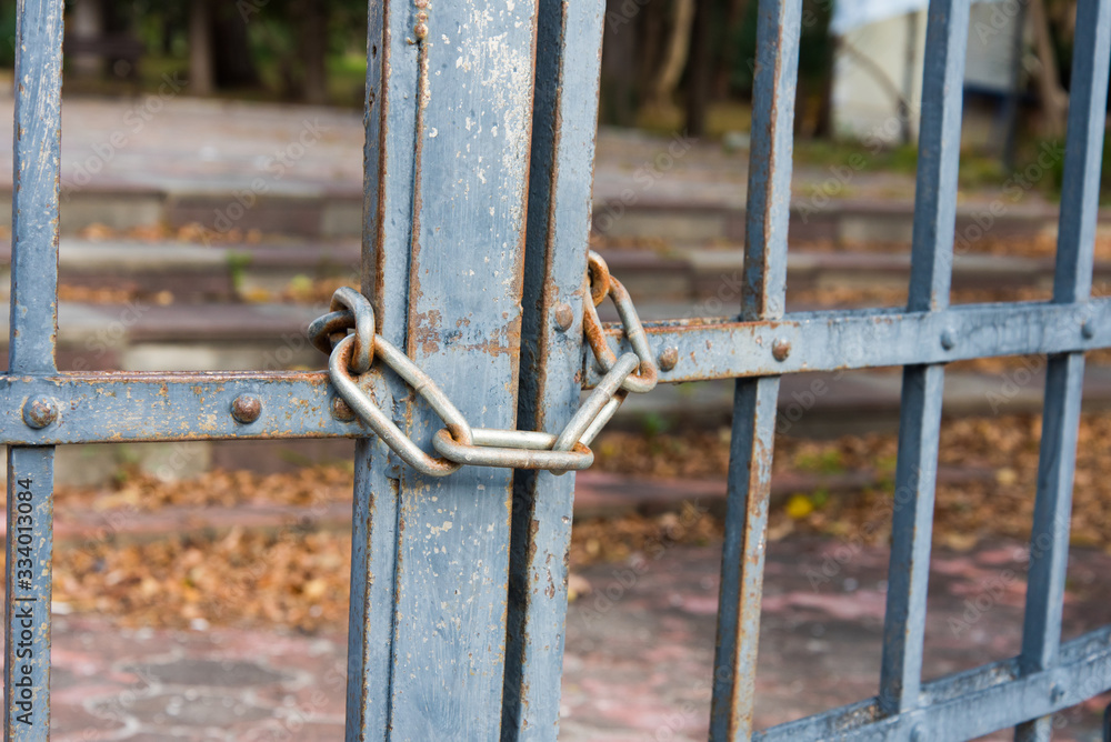 The gates of the city center park are closed due to the emergency of the coronavirus, self-isolation and restrictions around the world. Closed public places The gates of the city center park are closed due to the emergency of the coronavirus, self-isolation and restrictions around the world. Closed public places