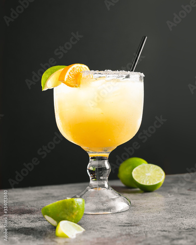 Mexican lime lemon margarita with black backdrop