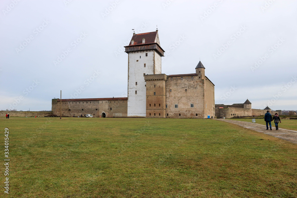 beautiful medieval Hermann castle with white tower in Narva, Estonia beautiful medieval Hermann castle with white tower in Narva, Estonia