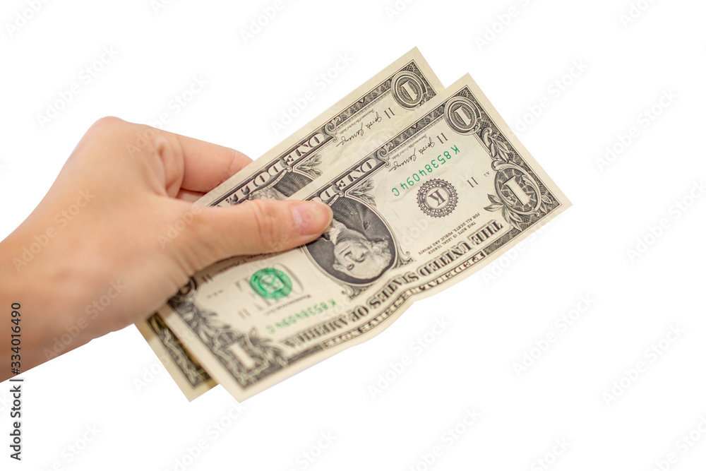 Hand holding dollar bills isolated on white background. Hand holding dollar bills isolated on white background.