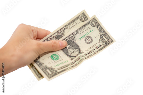 Hand holding dollar bills isolated on white background.