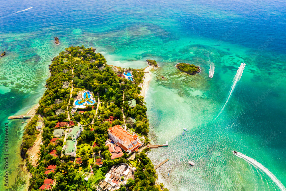 Aerial drone view of beautiful caribbean tropical island Cayo Levantado with palms. Bacardi Island, Dominican Republic. Vacation background.