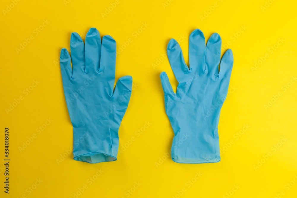 protective mask and gloves on a yellow background protective mask and gloves on a yellow background