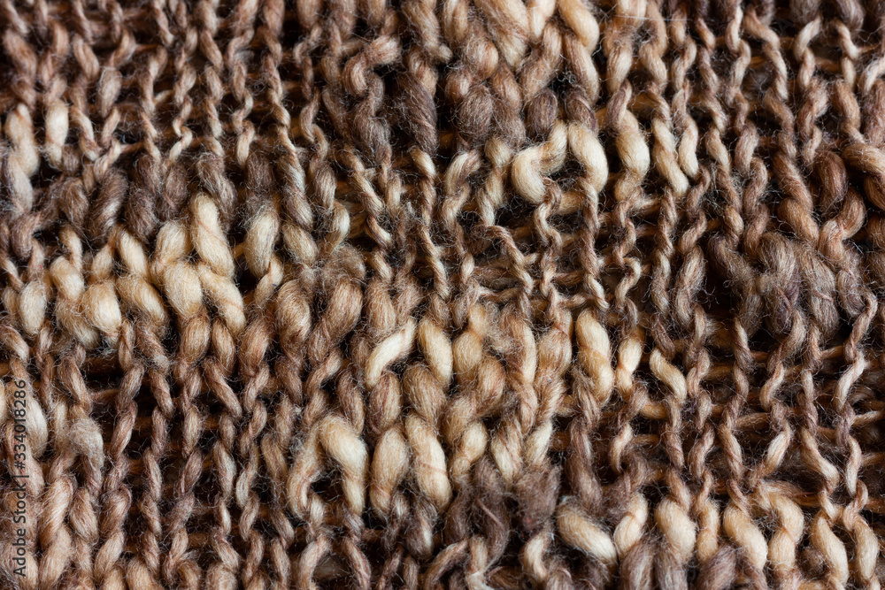 Knitted woolen texture of the booklet, large viscous. Hobby stay at home, creative hand made.
