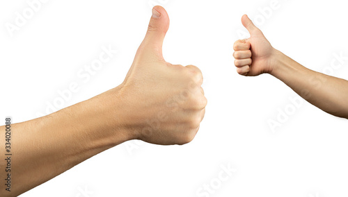 Hands show thumb up on a white isolated background