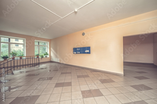 Empty hall with mailboxes and elevator doors