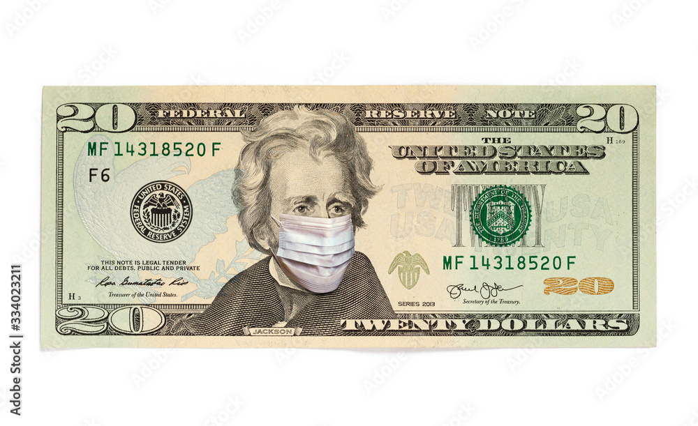 Coronavirus COVID-19 in USA. Quarantine and global recession. Andrew Jackson in healthcare surgical mask on a twenty dollar bill. Global economy hit by corona virus outbreak and pandemic. Coronavirus COVID-19 in USA. Quarantine and global recession. Andrew Jackson in healthcare surgical mask on a twenty dollar bill. Global economy hit by corona virus outbreak and pandemic.