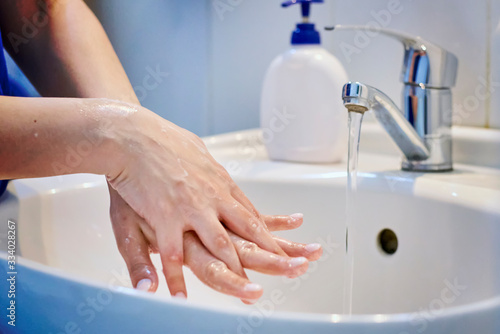 Woman washing hands