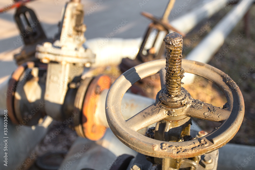 Several valves of heating systems and pipes outdoor Several valves of heating systems and pipes outdoor