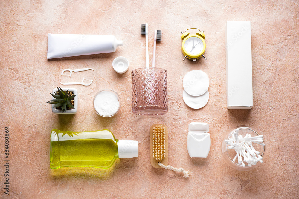 Flat lay composition of bath accessories and cosmetics on beige background, flat lay. Close-up