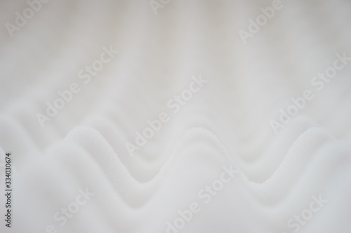 White gradient abstract background with many waves at different angles. photo