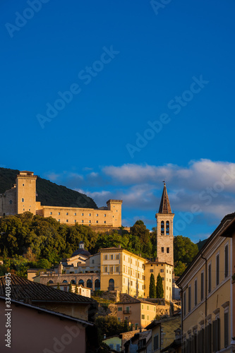 The ancient city of Spoleto in Umbria, with it most famous landmarks and sunset golden light (with copy space above)