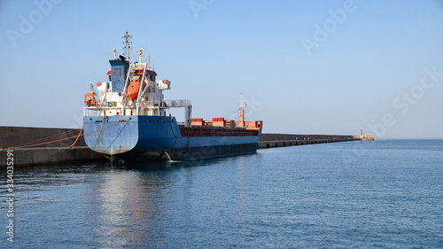 Cargo ship docked at the port of Heraklion, island of Crete, Greece.