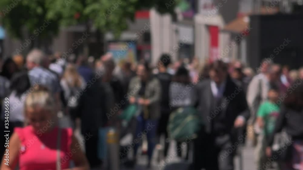 Defocused shot of crowds in city shopping UK 4K Defocused shot of crowds in city shopping UK 4K