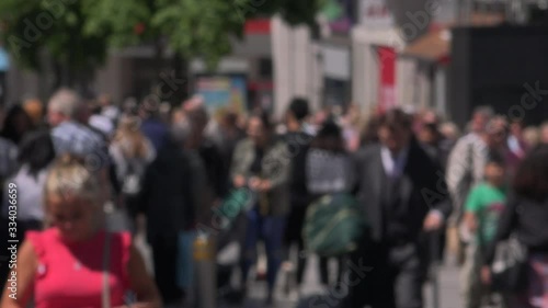Wallpaper Mural Defocused shot of crowds in city shopping UK 4K Torontodigital.ca