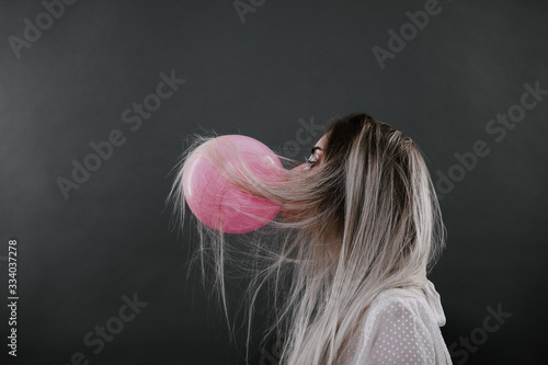 Young woman with balloon