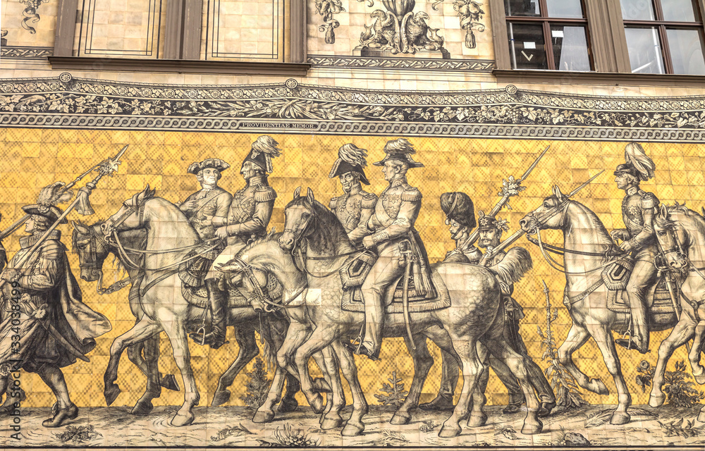 Furstenzug giant mural decorates mosaic on the wall of Augustus Street in Dresden, Germany