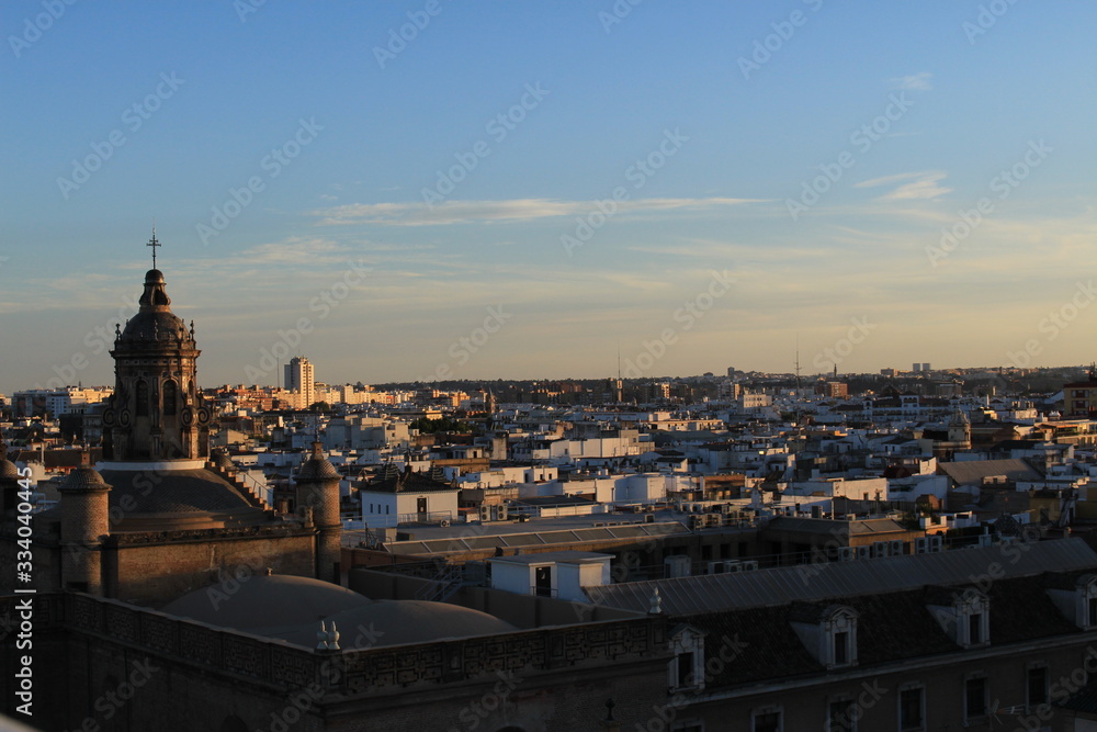 Naklejka premium Seville city view at sundown from top of the Metropol Parasol (Setas de Sevilla) building.
