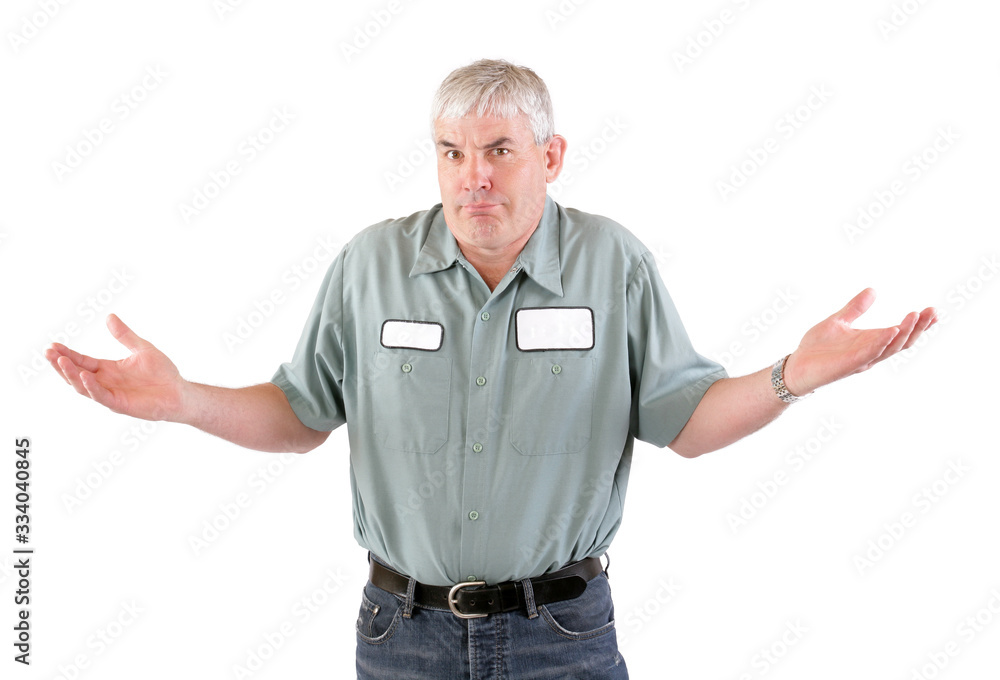 A confused adult male serviceman worker with blank name tag on shirt with his arms out.