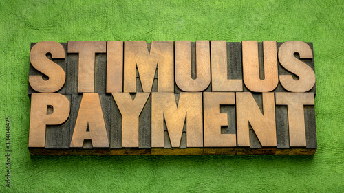 Принти на полотні stimulus payment word abstract in wood type