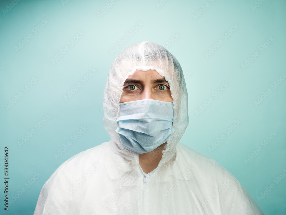 Man in protective suit and medical mask Man in protective suit and medical mask