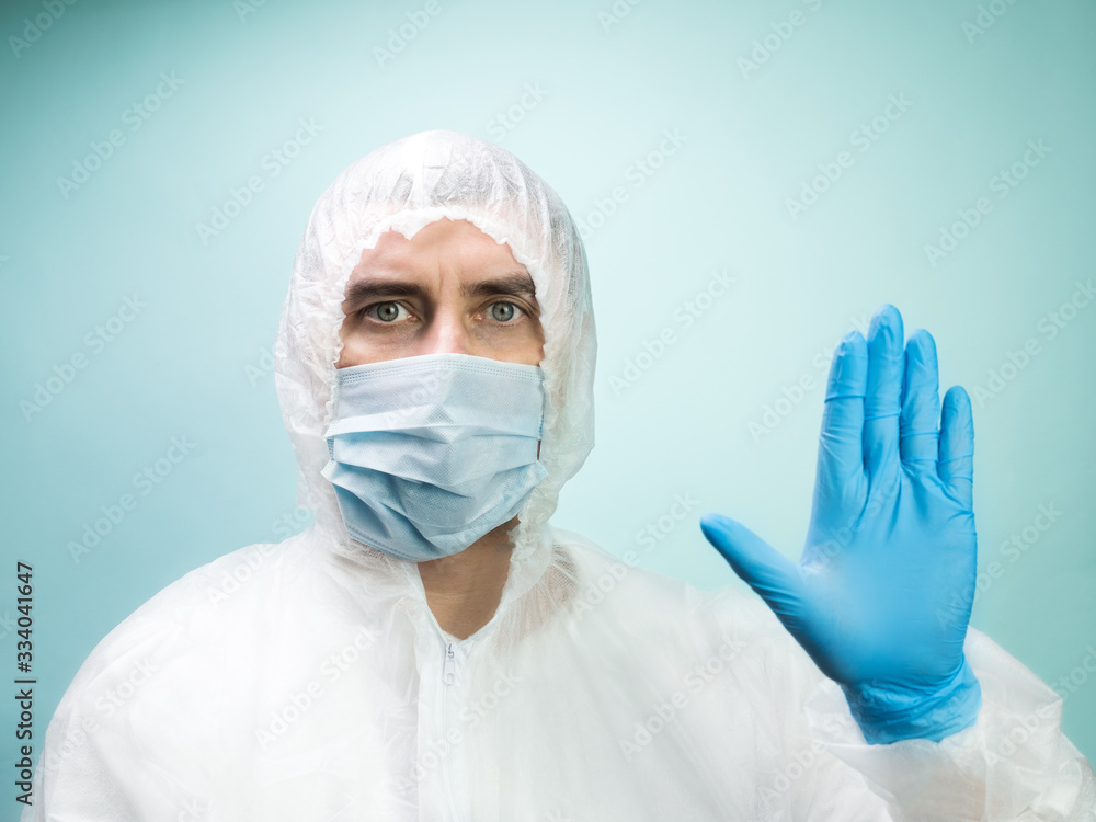 Man in protective suit and medical mask Man in protective suit and medical mask